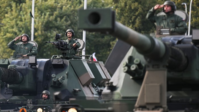Self-propelled howitzers take part in Poland’s annual Armed Forces Day parade