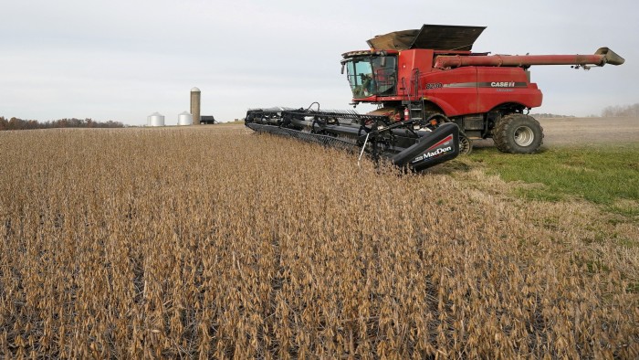 Soyabeans are harvested from a field on Hodgen Farm in Roachdale, Indiana, US