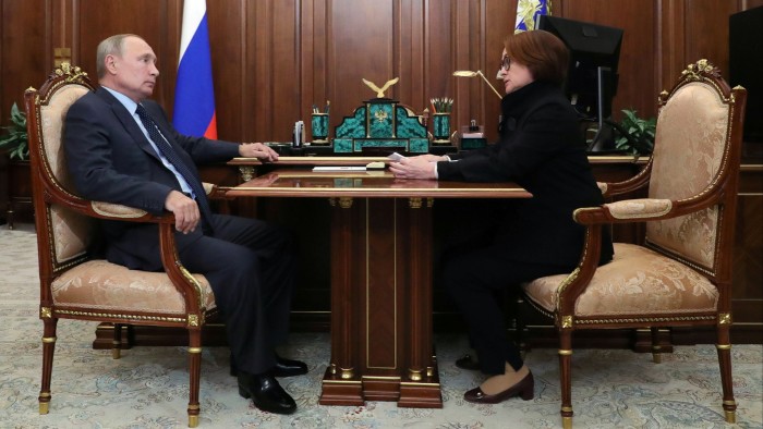 Russia’s President Vladimir Putin attends a meeting with Governor of Russian Central Bank Elvira Nabiullina in Moscow