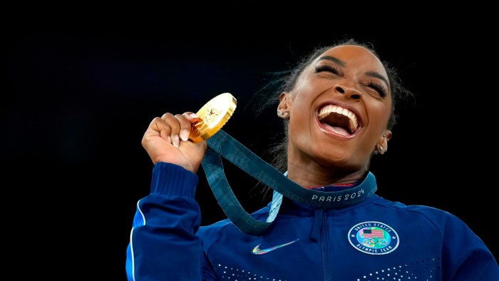 US gymnast Simone Biles celebrates after winning the gold medal