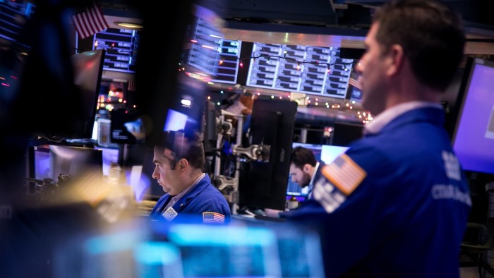Traders on the floor of the New York Stock Exchange