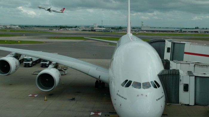 An emirates Airbus A380 aircraft sits on the gate at Heathrow airport in London