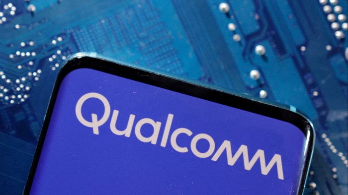 The Qualcomm logo on a smartphone