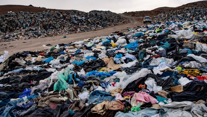 A large pile of used clothes discarded in the Atacama Desert, Chile