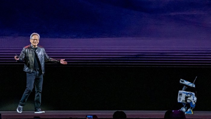 Jensen Huang with a robot named Blue at its annual GTC conference in San Jose on Tuesday