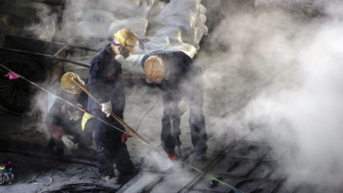 Workers at the Jinguan Copper smelter, operated by Tongling Nonferrous Metals Group in Tongling, Anhui province, China