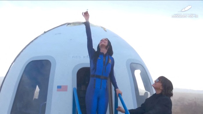 Katy Perry exits the Blue Origin capsule