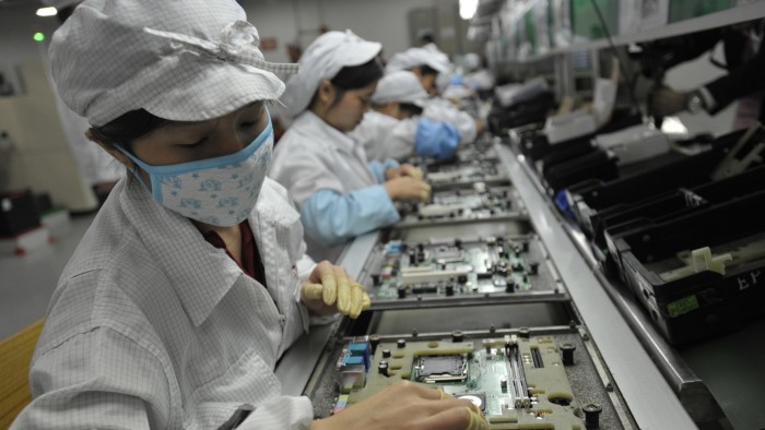 Chinese workers in the Foxconn factory in Shenzhen, in southern China’s Guangdong province