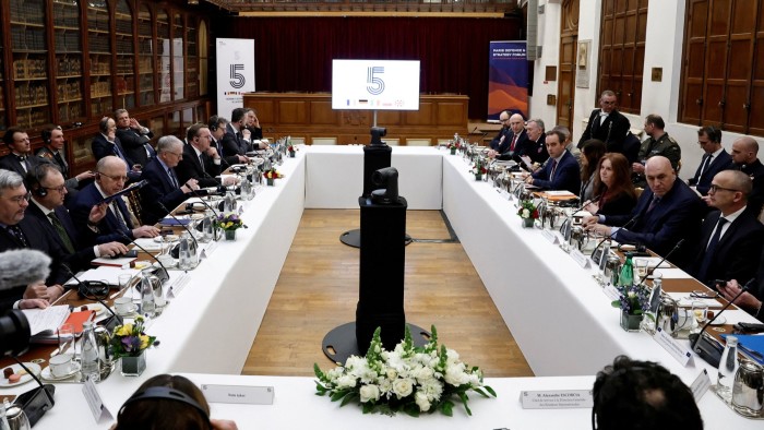 Defence ministers from ‘coalition of the willing’ countries sit around a table at Nato’s headquarters
