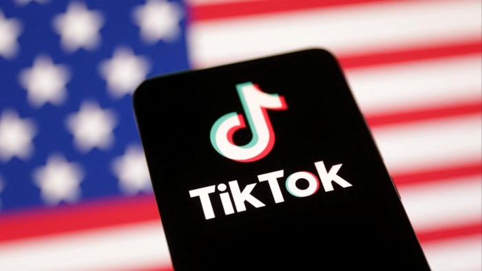 A montage of a US flag and the TikTok logo on a phone