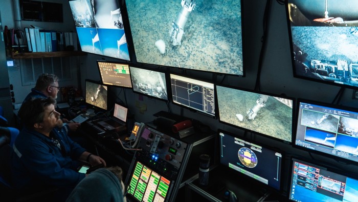 Deep sea mining engineers use a remotely operated vehicle to collect samples in the Pacific Ocean between Hawaii and Mexico