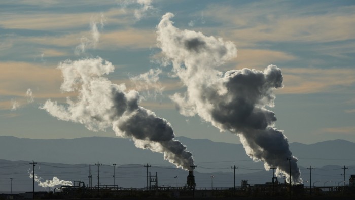 Steam rises from a geothermal power station