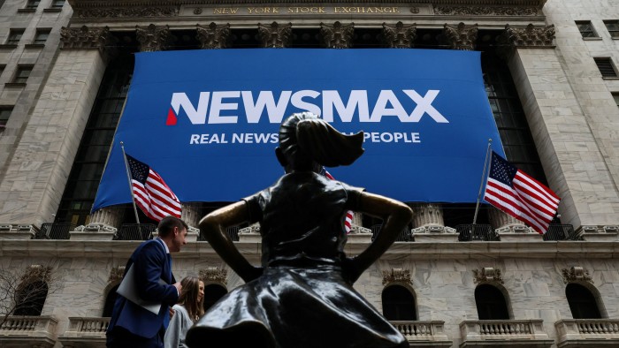 Newsmax sign outside the New York Stock Exchange