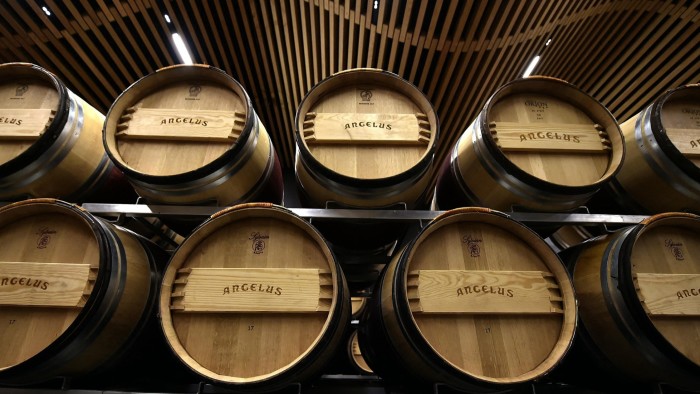 Wine barrels at Château Angélus in Saint-Emilion, near Bordeaux