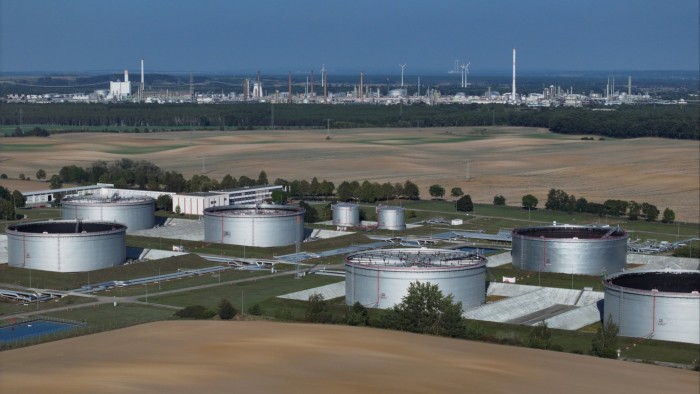 a storage site in front of an oil refinery in Germany