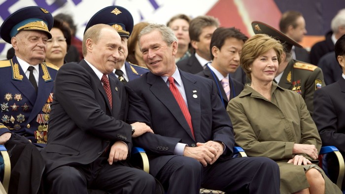 George W. Bush and Russian President Vladimir Putin at the parade to commemorate the 60th anniversary of the end of World War II.