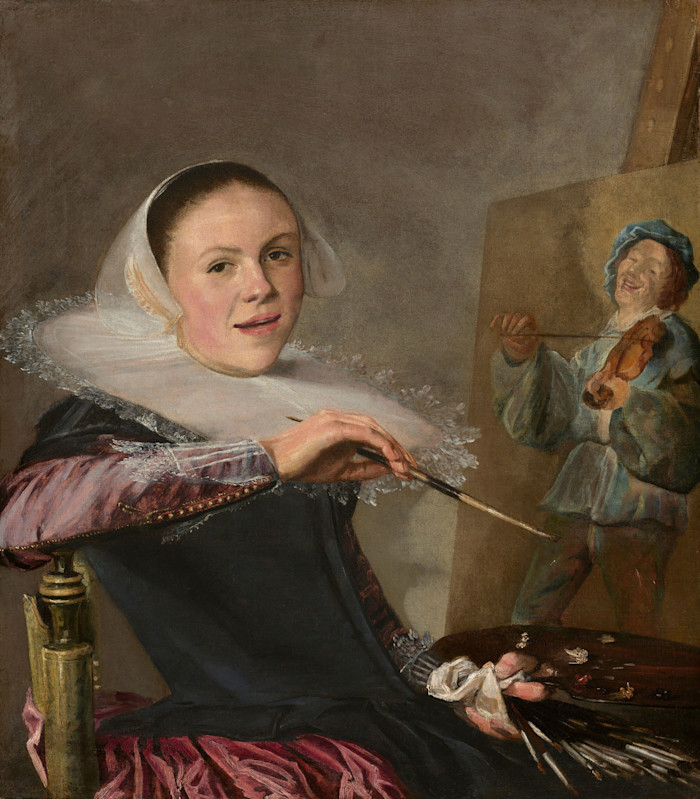Autoritratto ad olio su tela dell'artista Judith Leyster, con indosso una cuffia bianca e una gorgiera bianca del XVII secolo. Guarda lo spettatore, seduta a un cavalletto, con in mano un pennello e una tavolozza, dipingendo un violinista su una tela.